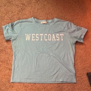 Baby blue “west coast” crop top. Slightly worn. Runs small